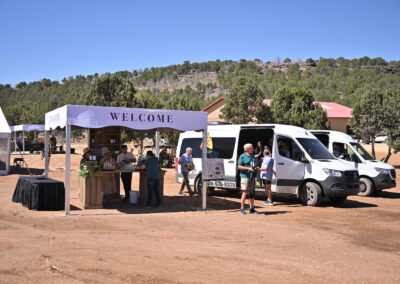 People getting out of van at wine vineyard
